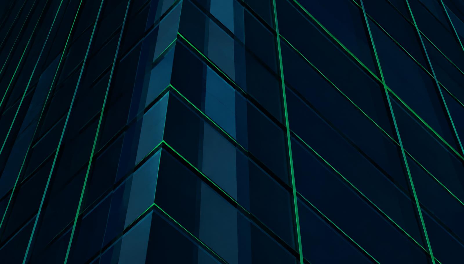 Glass facade with green light lines